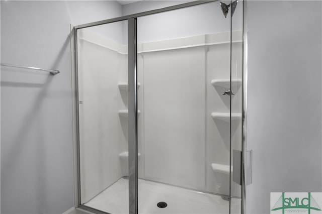 bathroom featuring walk in shower