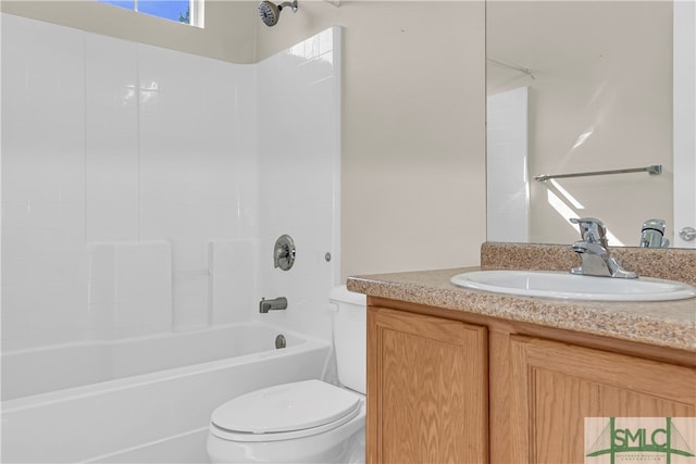 full bathroom featuring toilet, vanity, and shower / washtub combination