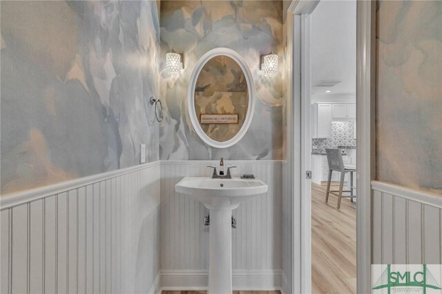 bathroom featuring hardwood / wood-style floors and sink