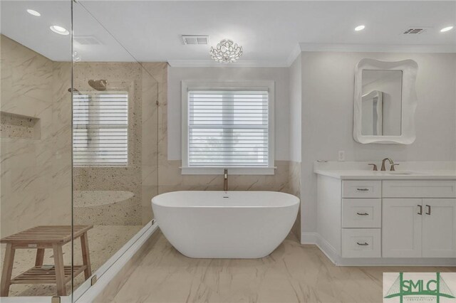 bathroom with vanity, tile patterned flooring, tile walls, crown molding, and independent shower and bath