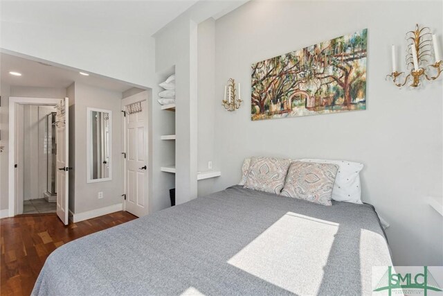 bedroom featuring dark wood-type flooring