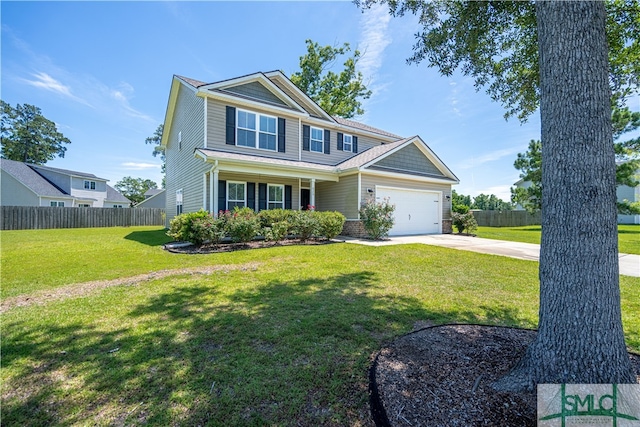 view of front of house featuring a garage and a front yard