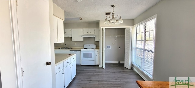 kitchen featuring an inviting chandelier, white appliances, dark hardwood / wood-style floors, a textured ceiling, and white cabinetry