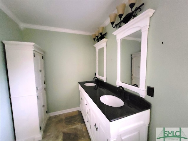 bathroom with vanity and ornamental molding