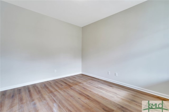 unfurnished room featuring light wood-type flooring