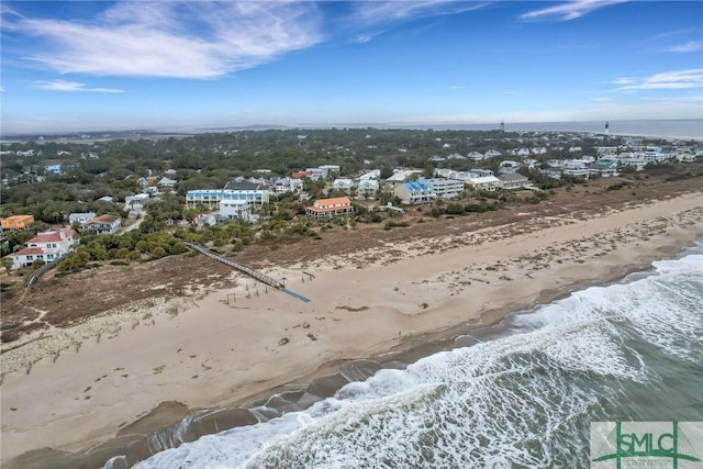 bird's eye view featuring a beach view and a water view