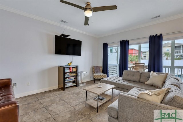 living room featuring ceiling fan, crown molding, and tile patterned floors