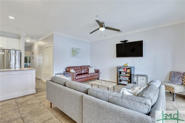 tiled living room with crown molding and ceiling fan