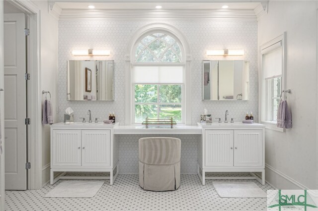 bathroom featuring vanity and crown molding