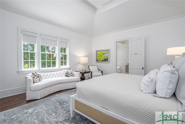 bedroom featuring lofted ceiling, crown molding, and dark hardwood / wood-style floors