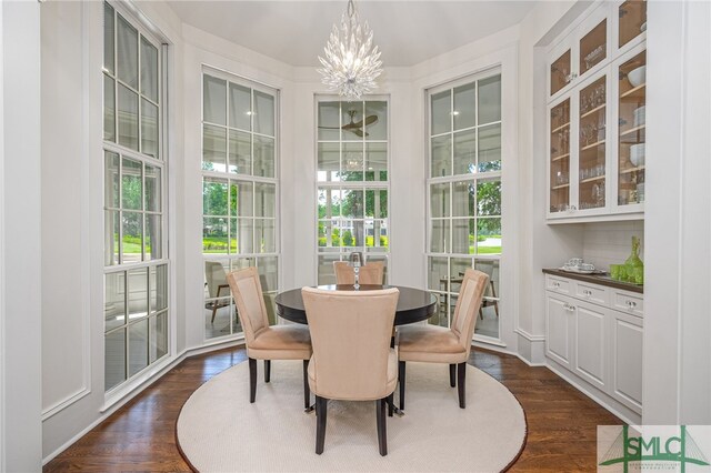 dining room featuring a chandelier and dark hardwood / wood-style flooring