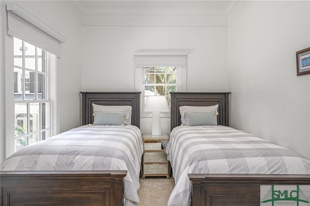 bedroom with crown molding