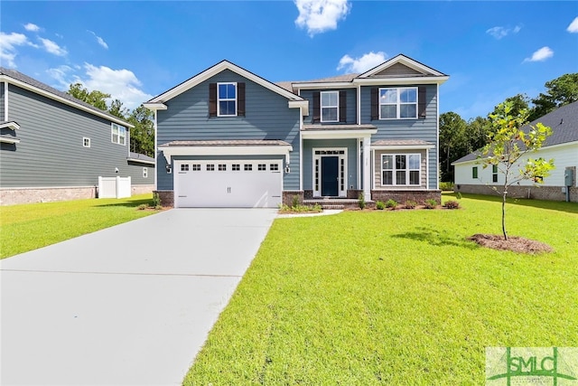 view of front of house featuring a garage and a front lawn