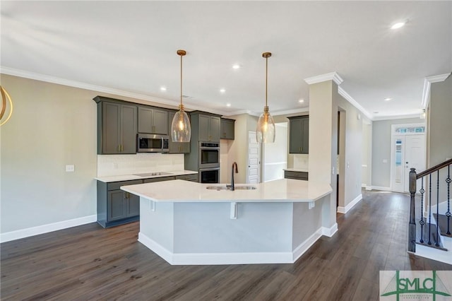 51 Hanover Pl, Richmond Hill, GA 31324 - kitchen with tasteful backsplash, appliances with stainless steel finishes, a sink, and dark wood-type flooring