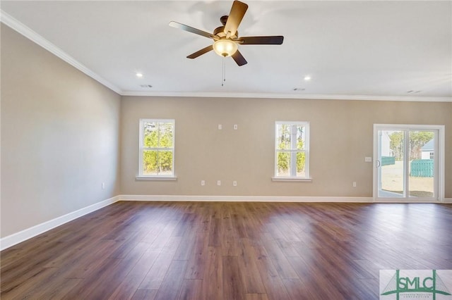 51 Hanover Pl, Richmond Hill, GA 31324 - spare room featuring dark wood-style flooring, ceiling fan, and crown molding