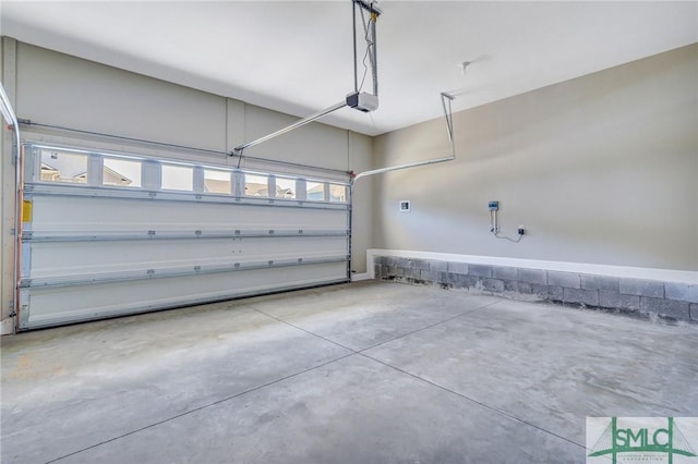 51 Hanover Pl, Richmond Hill, GA 31324 - garage featuring a garage door opener