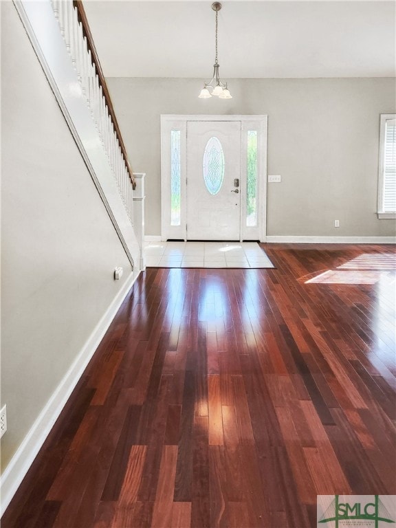 foyer entrance featuring hardwood / wood-style floors