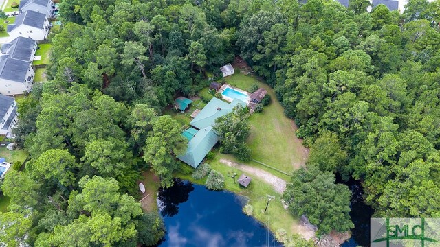 bird's eye view with a water view