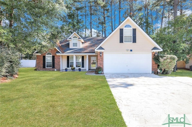 view of front of house featuring a front yard and a garage