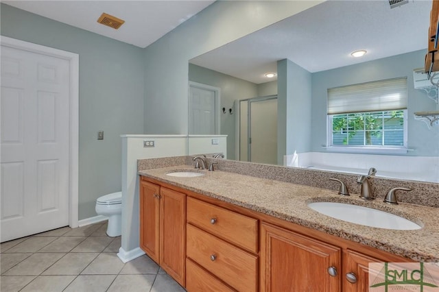 full bathroom featuring separate shower and tub, tile patterned flooring, vanity, and toilet