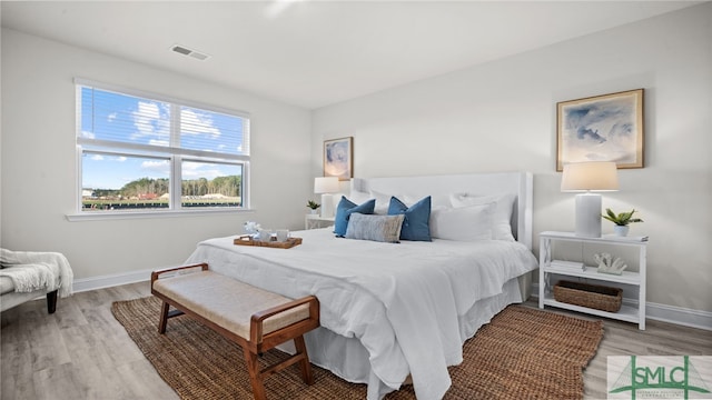 bedroom featuring hardwood / wood-style flooring