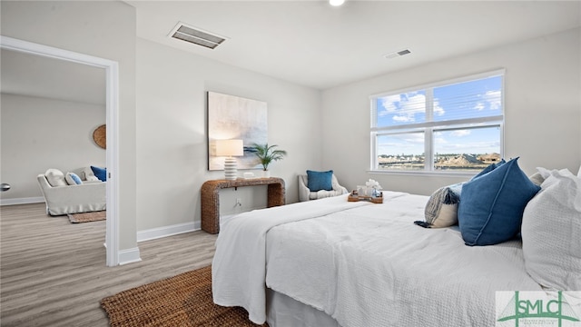 bedroom featuring light hardwood / wood-style floors