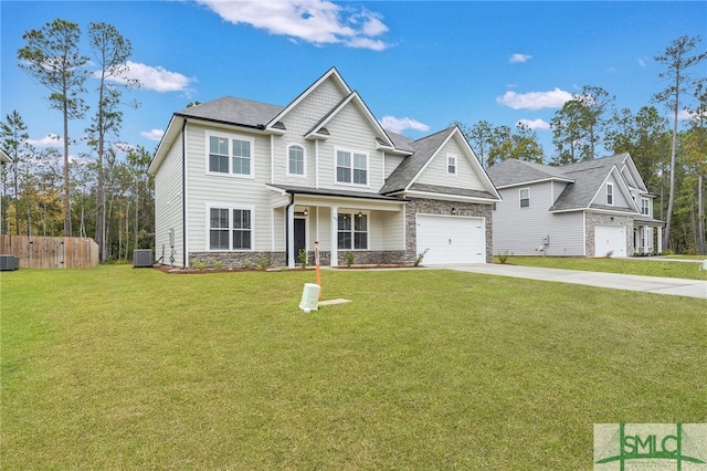 view of front of house with central AC unit, covered porch, and a front yard