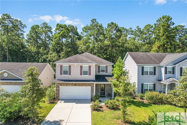 traditional-style house featuring an attached garage, brick siding, driveway, and a front lawn