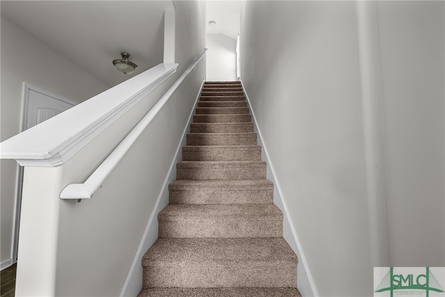 staircase with baseboards