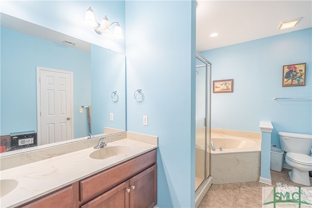 full bathroom with tile patterned flooring, separate shower and tub, vanity, and toilet