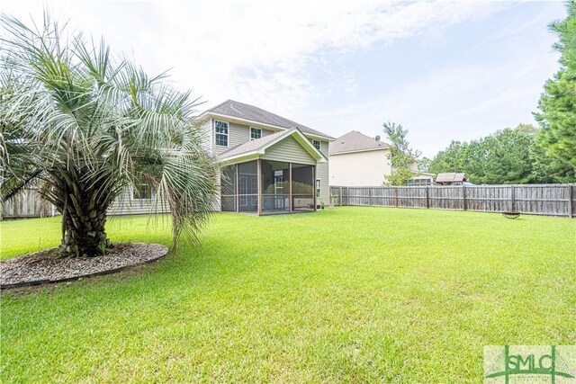 view of yard with a sunroom