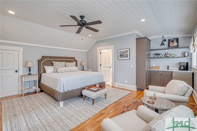 bedroom with lofted ceiling, wood ceiling, wet bar, light hardwood / wood-style floors, and ceiling fan