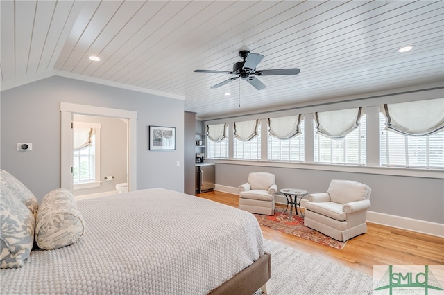 1654 Dublin Dr, Richmond Hill, GA 31324 - bedroom featuring baseboards, multiple windows, and wood finished floors