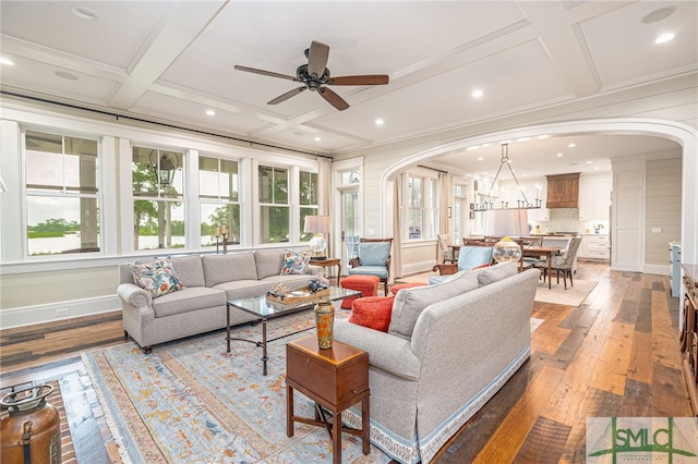 1654 Dublin Dr, Richmond Hill, GA 31324 - living area featuring arched walkways, coffered ceiling, crown molding, and hardwood / wood-style floors