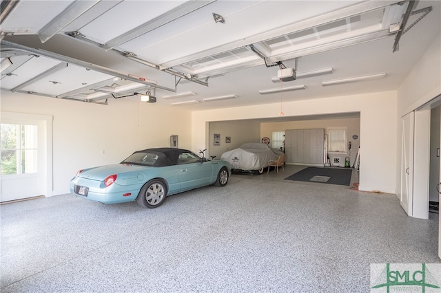 1654 Dublin Dr, Richmond Hill, GA 31324 - garage featuring a garage door opener