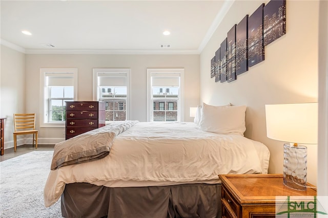 bedroom with ornamental molding