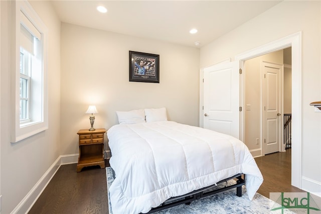 bedroom featuring dark hardwood / wood-style floors