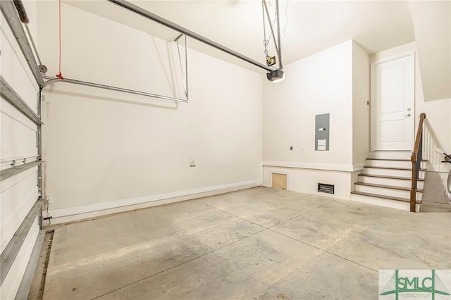 453 Port St, Savannah, GA 31401 - garage with electric panel and a garage door opener