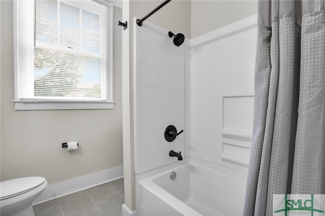 bathroom with tile patterned floors, shower / tub combo, and toilet