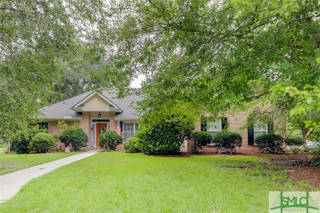 ranch-style house featuring a front lawn