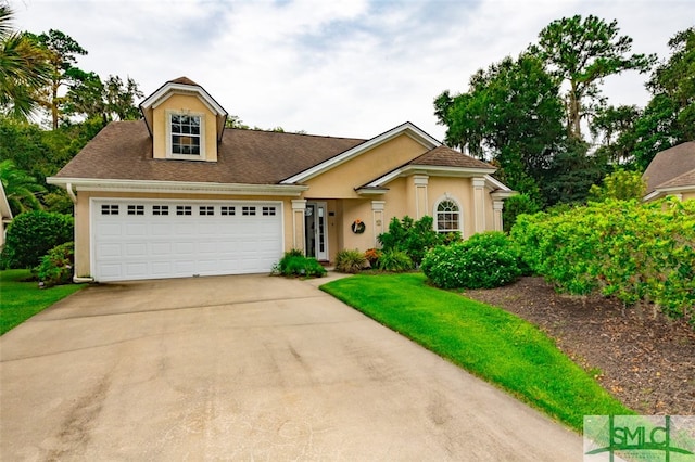 view of front of property with a garage