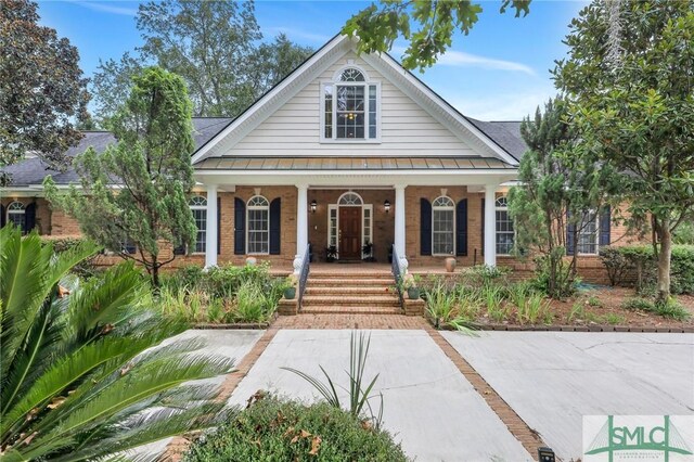 view of front of home featuring covered porch