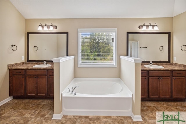 bathroom featuring separate shower and tub, tile patterned flooring, and vanity