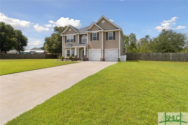 view of front of property featuring a garage and a front lawn