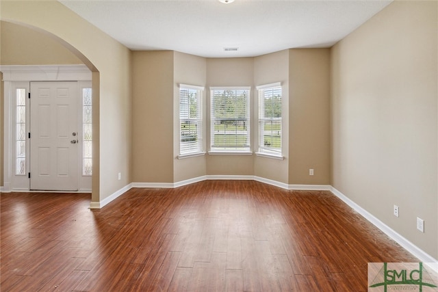 entrance foyer featuring hardwood / wood-style flooring