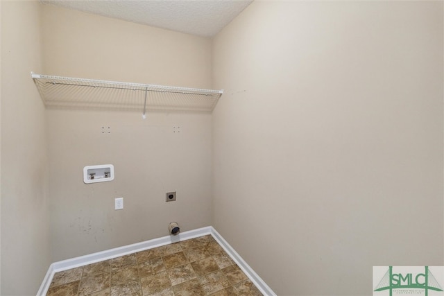 laundry area featuring tile patterned floors, hookup for an electric dryer, and hookup for a washing machine