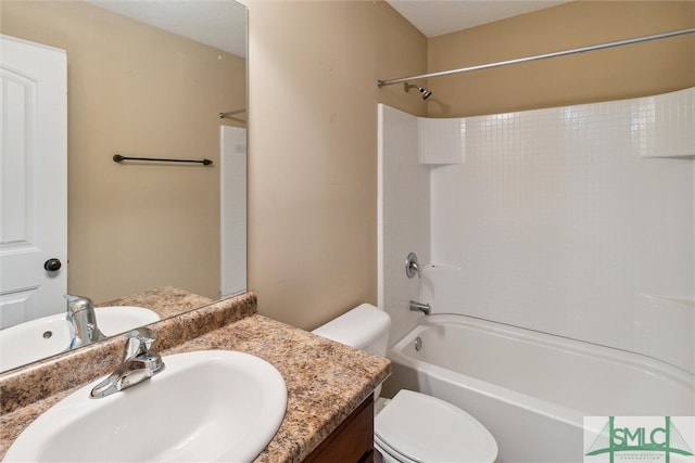 full bathroom with toilet, washtub / shower combination, and vanity