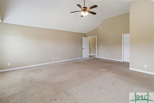 spare room with carpet floors, ceiling fan, and high vaulted ceiling