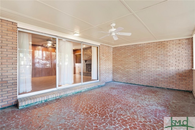 view of patio with ceiling fan