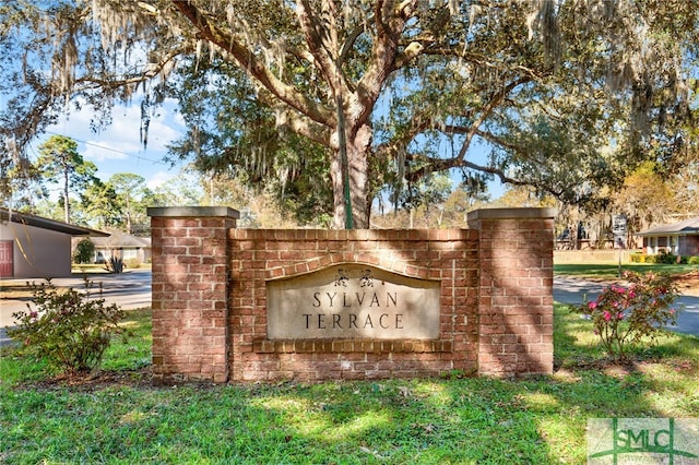 view of community sign